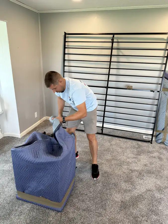 Movers in Alexandria VA. Blue Crab crew on the job in an Old Town Alexandria home.