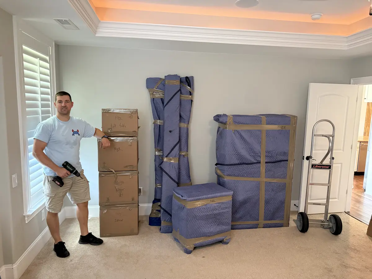 Movers in Arlington VA. Blue Crab crew loaded and ready at the back of the truck.