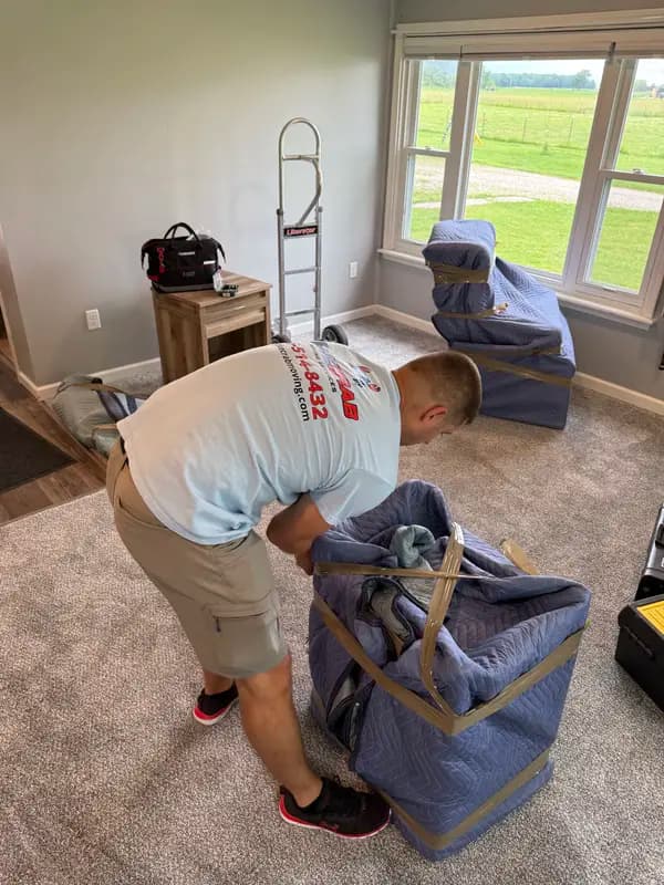 Movers in Germantown MD. Blue Crab crew on the job in a Montgomery County home.