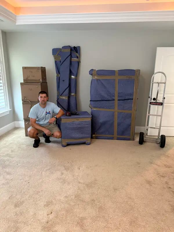 Movers in WV. Blue Crab crew on the job in a Berkeley County home.