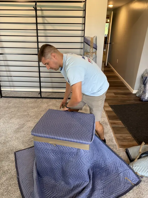 Moving services in Northern Virginia. Blue Crab crew on the job in a Northern VA home.